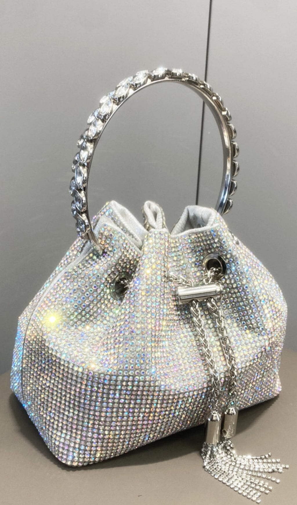 CRYSTAL EMBELLISHED BUCKET BAG IN SILVER Bags styleofcb